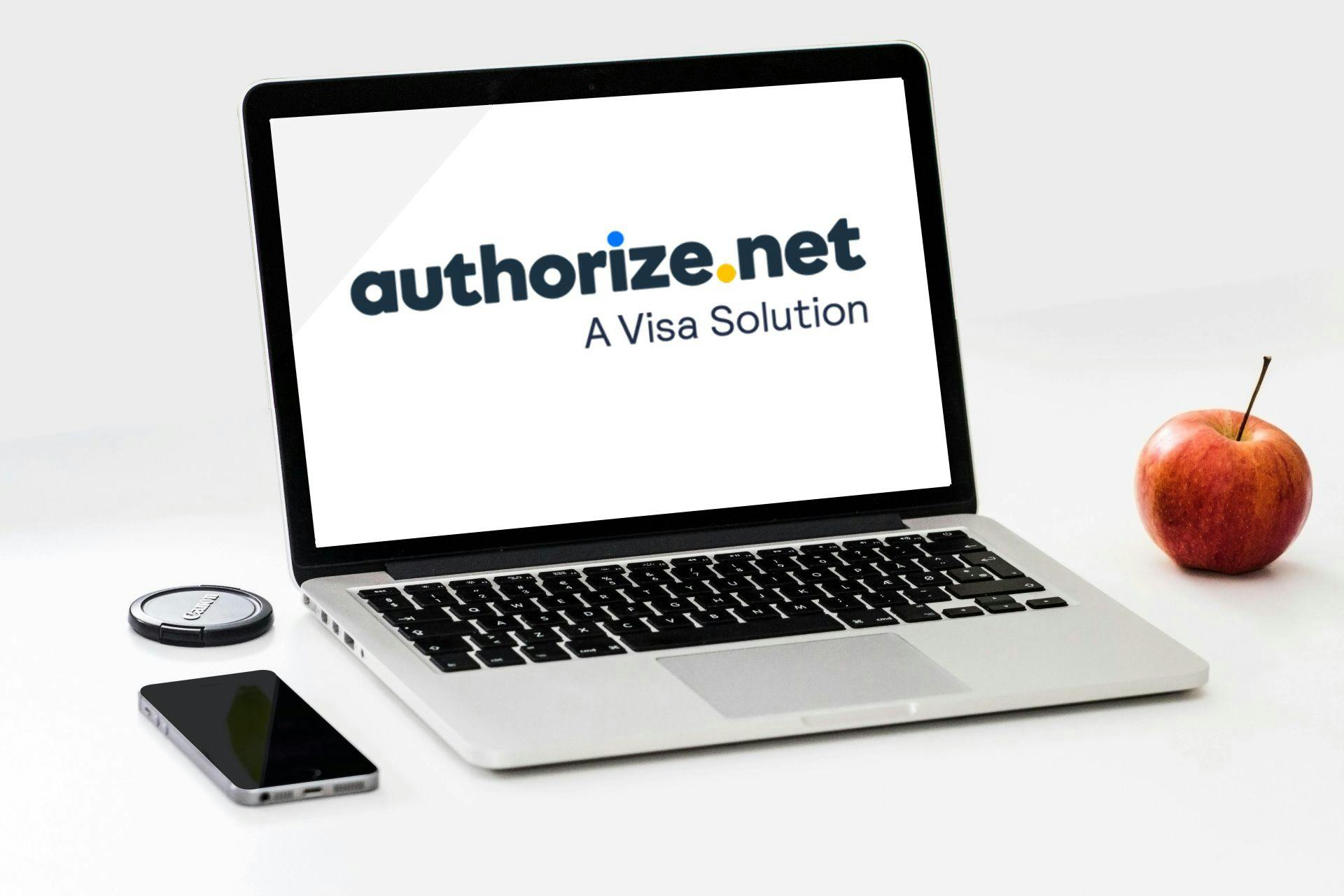 Authorize.net logo on laptop