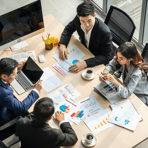Background image of business coaching taking place