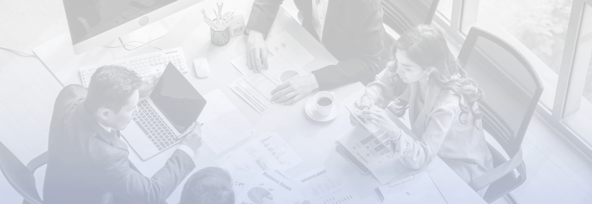 Background image of business coaching taking place