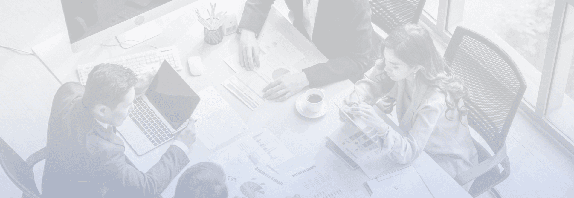 Background image of business coaching taking place