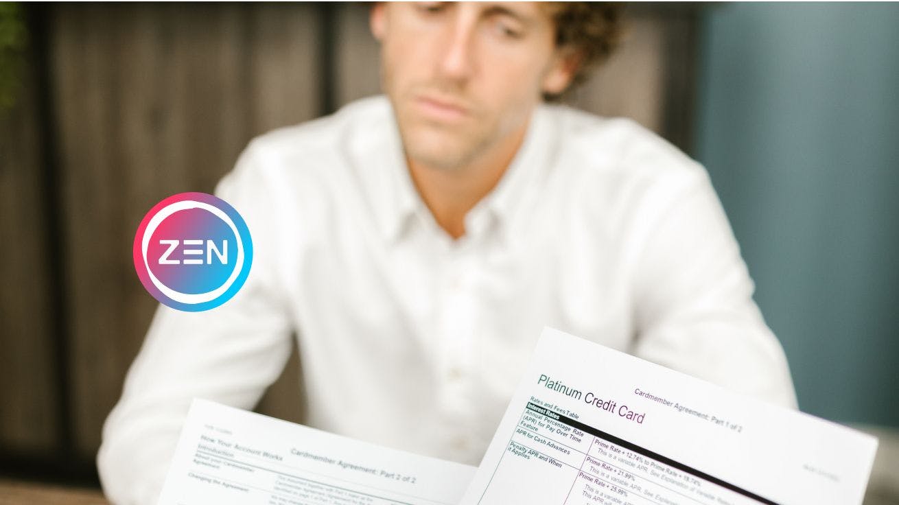 A man looking at a credit document 